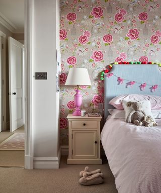 Children's bedroom with floral wallpaper