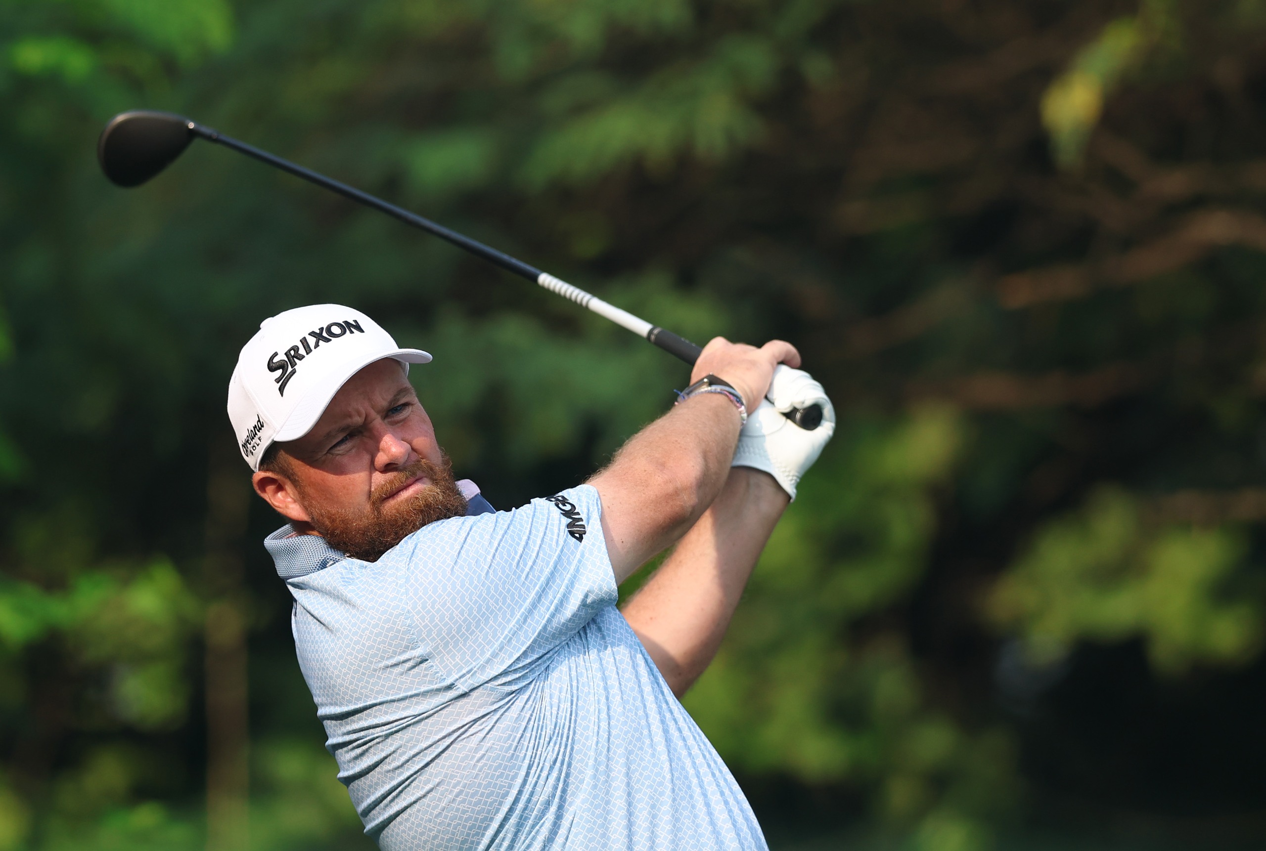 Shane Lowry on his follow-through on a fairway wood shot