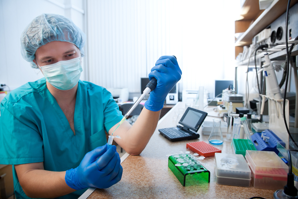 A scientist working in the lab.