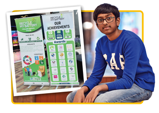 Image of young boy, Nihal Tammana, with a recycling poster