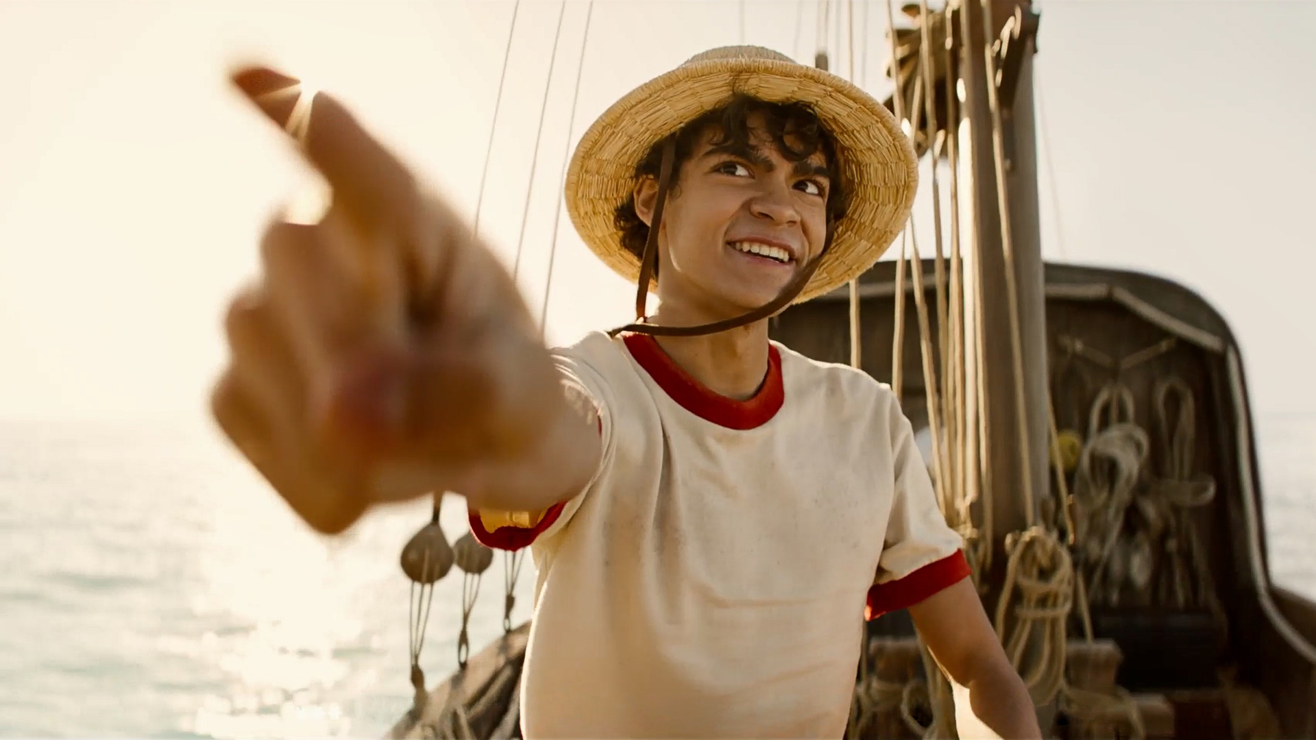 Monkey D. Luffy points to the horizon in One Piece live-action adaptation still