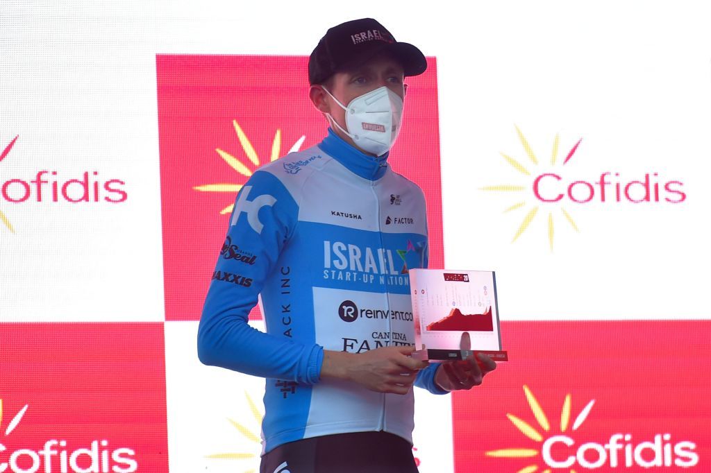 Team Israel Academy rider Irelands Daniel Martin celebrates on the podium after the 3rd stage of the 2020 La Vuelta cycling tour of Spain a 1661 km race from Lodosa to La Laguna Negra Vinuesa on October 22 2020 Photo by ANDER GILLENEA AFP Photo by ANDER GILLENEAAFP via Getty Images