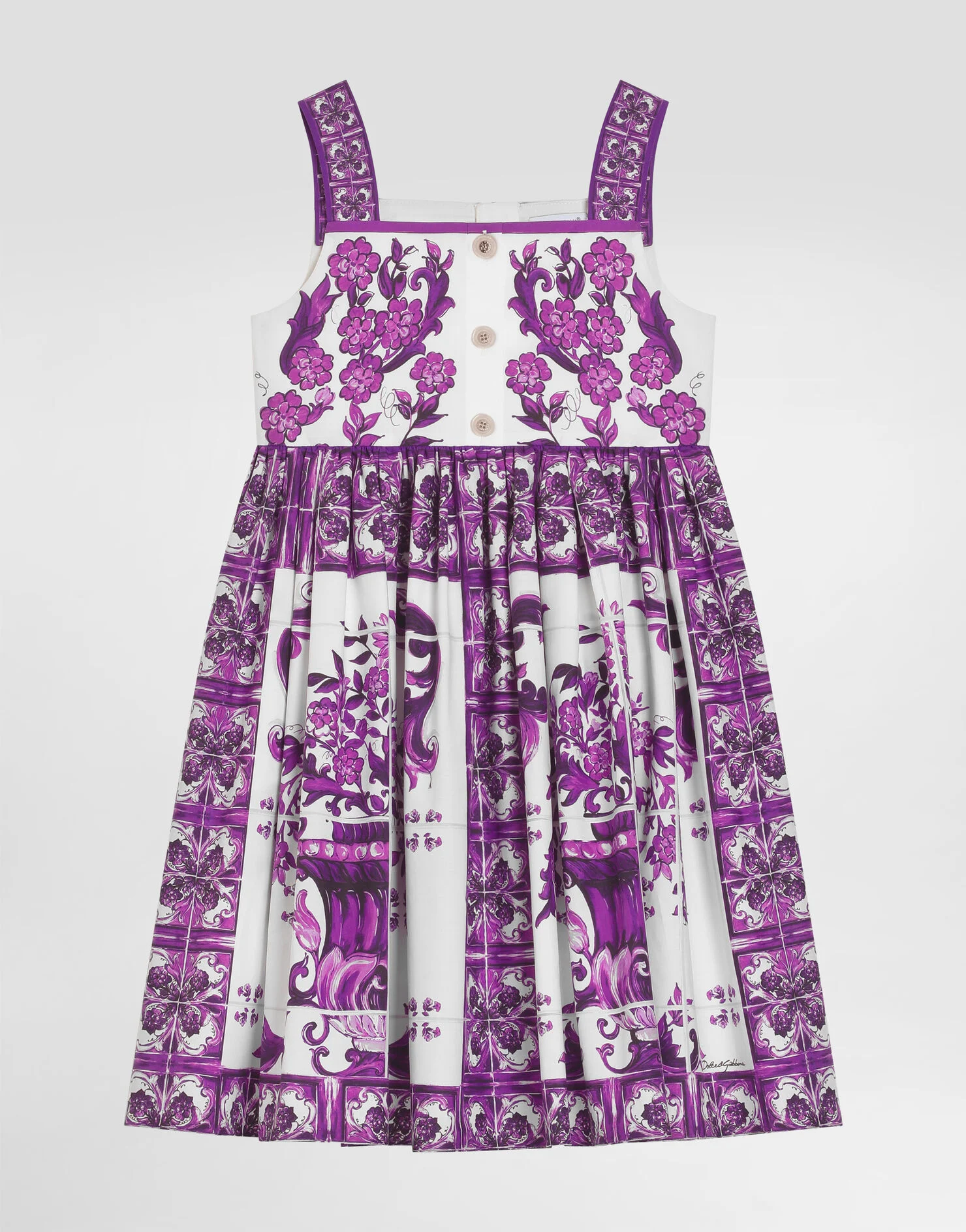 A child's white and purple Dolce & Gabbana floral dress