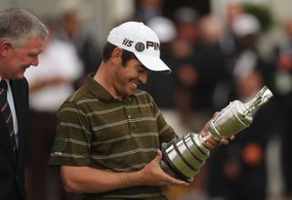 Louis Oosthuizen holds the Claret Jug