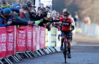 Anna Kay celebrates winning the elite women's British cyclocross national title
