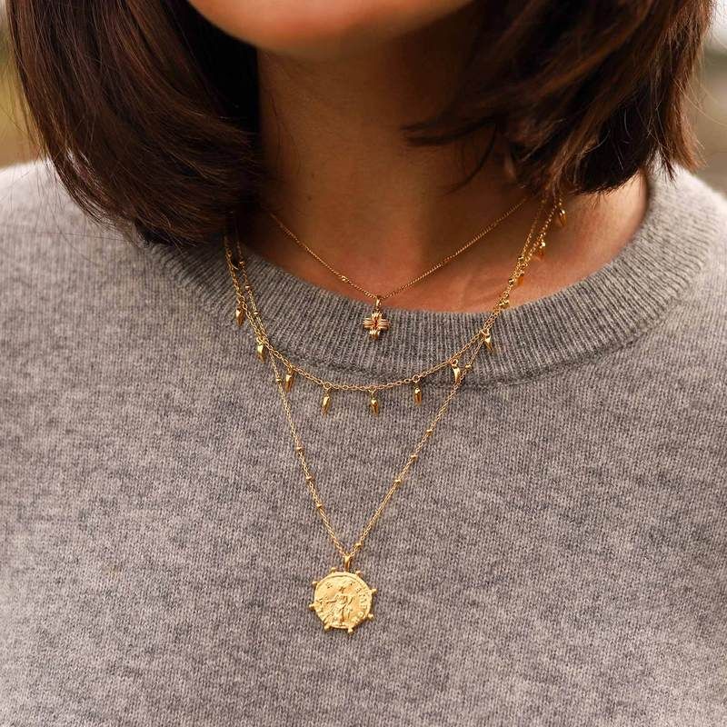 The best timeless gold coin necklaces to shop now |