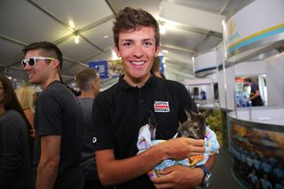 Lotto-Soudal's James Shaw with a baby kangaroo