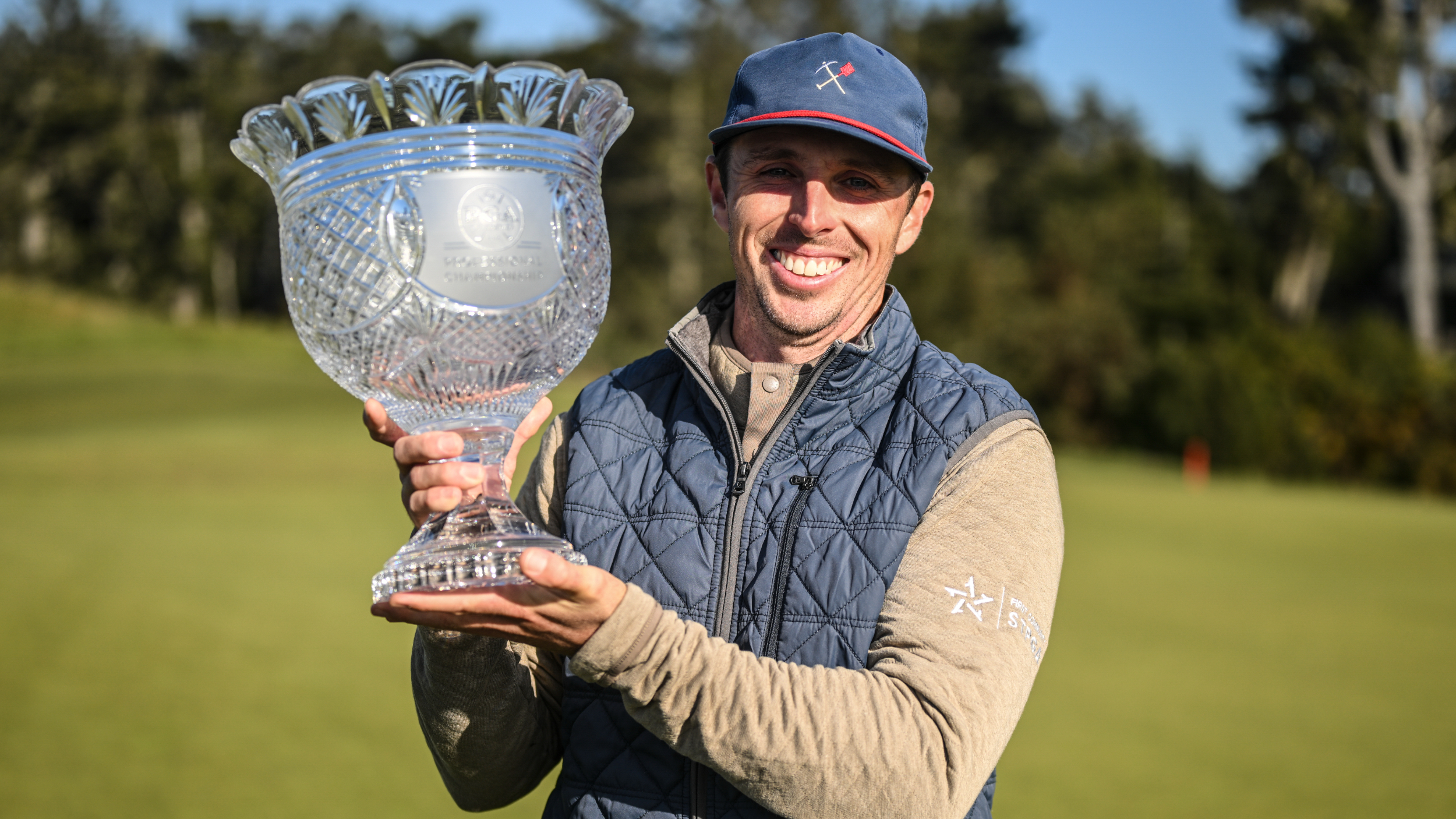 Jesse Droemer with the PGA Professional Championship trophy