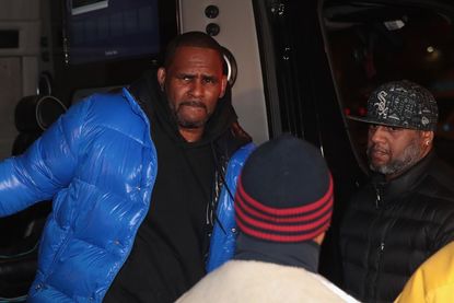  R&B singer R. Kelly arrives at the 1st District-Central police station on February 22, 2019 in Chicago, Illinois.