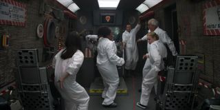 The study group aboard a flight simulator in the "Basic Rocket Science" episode of Community