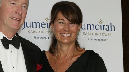 Carole Middleton and Derek Picot Regional VP Europe and General Manager of Jumeirah Carlton Tower, smile as they attend the British Red Cross Ambassadors Gala fundraiser