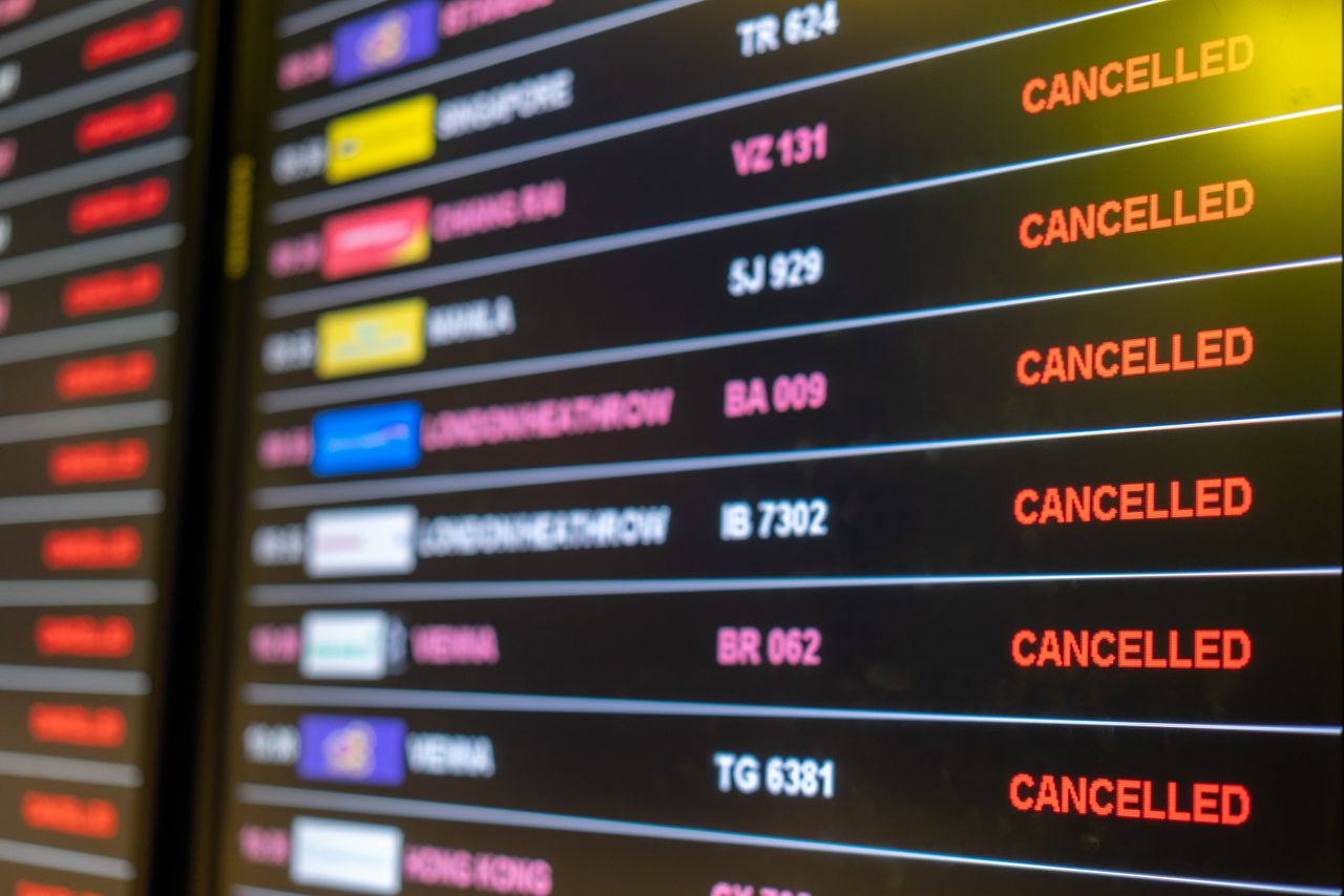 Airline departure board cancellations.