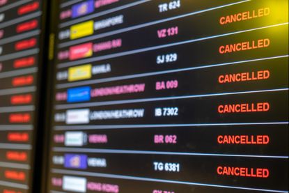 Airline departure board cancellations.