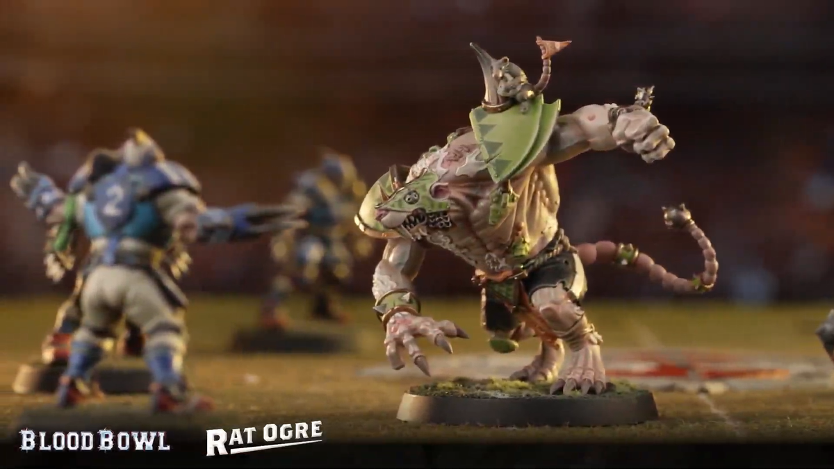 Larger, monstrous players rush through the pitch in Blood Bowl