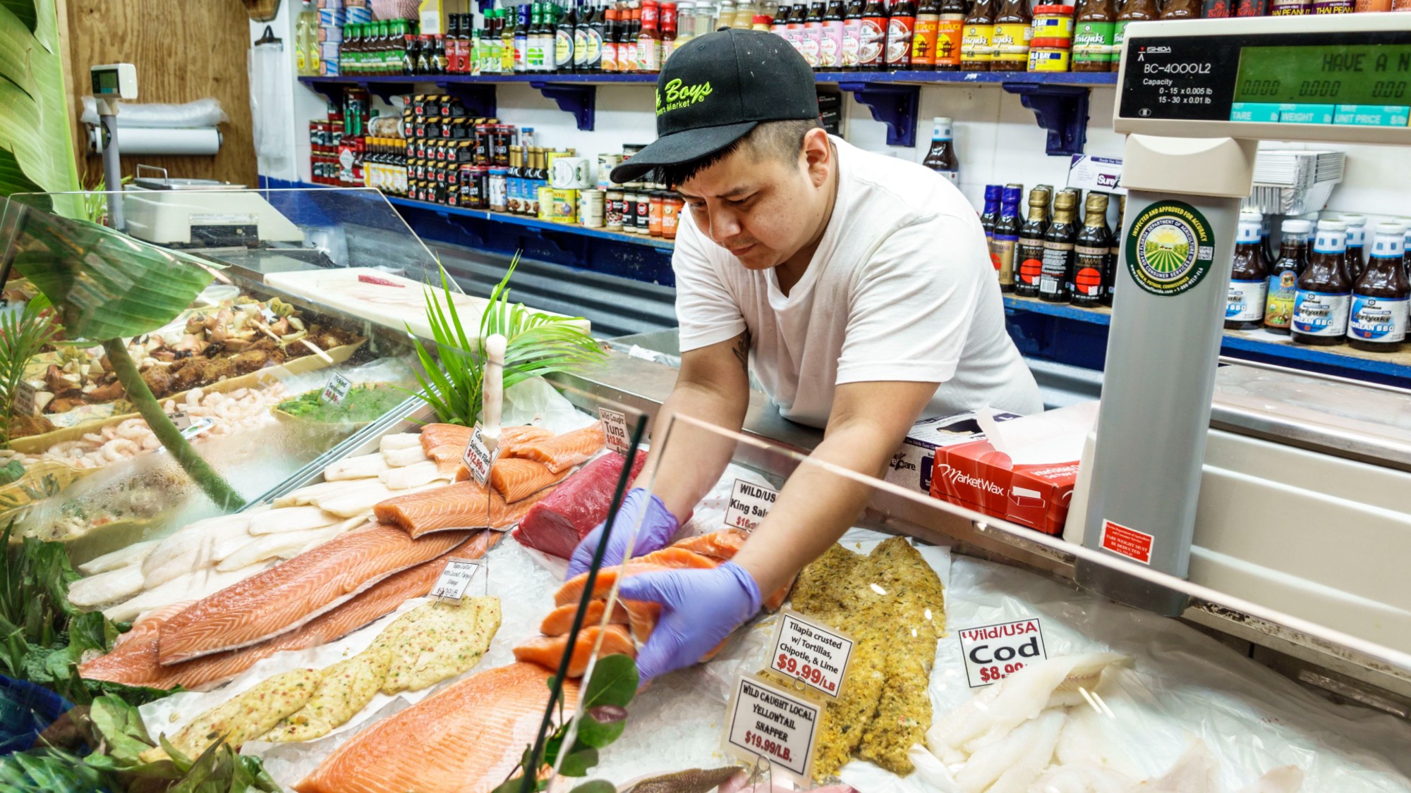 A fishmonger is seen at a store in Delray Beach, Florida. 