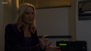 Kathy Beale being interrogated by police.
