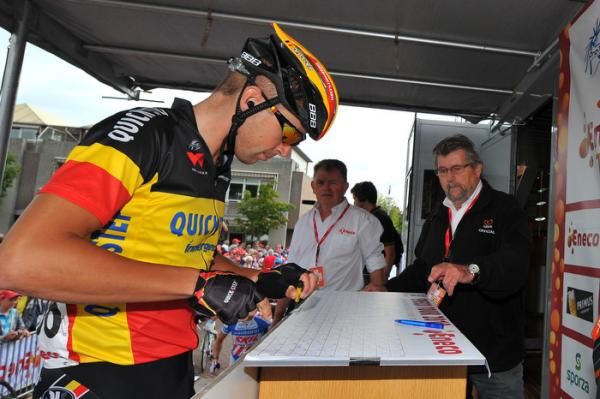 Belgian champion Stijn Devolder signs in.