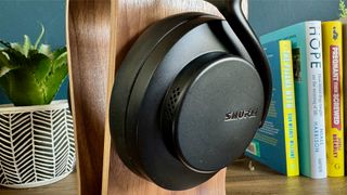 Shure Aonic 50 Gen 2 noise-cancelling over-ears on stand showing earcup