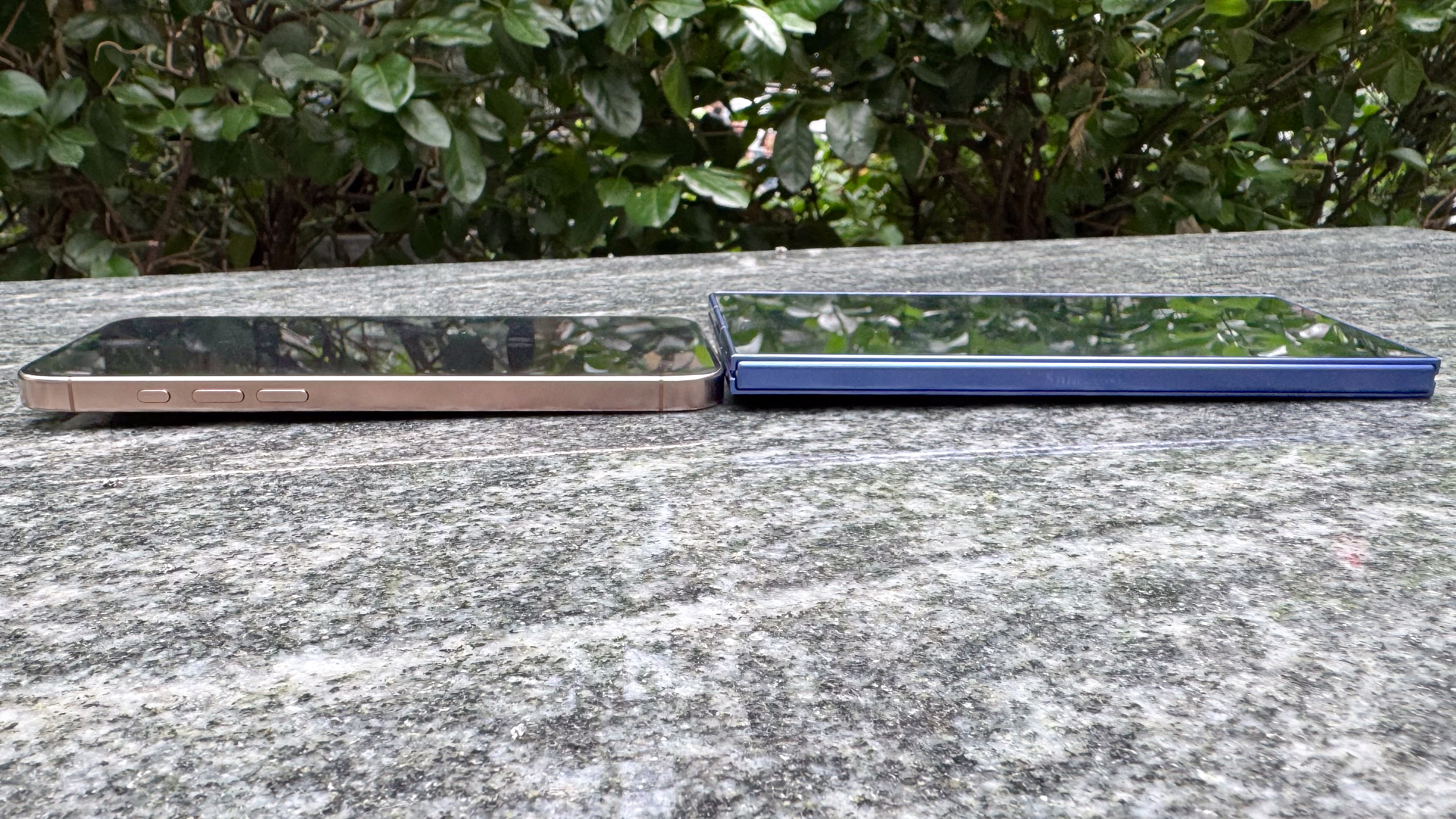 Samsung Galaxy Z Fold 7 and iPhone 16 Pro Max shown on their side