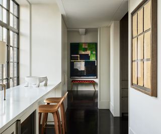 kitchen seating space with bench and stools