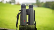 Leica Noctivid 10x42 on a fence post