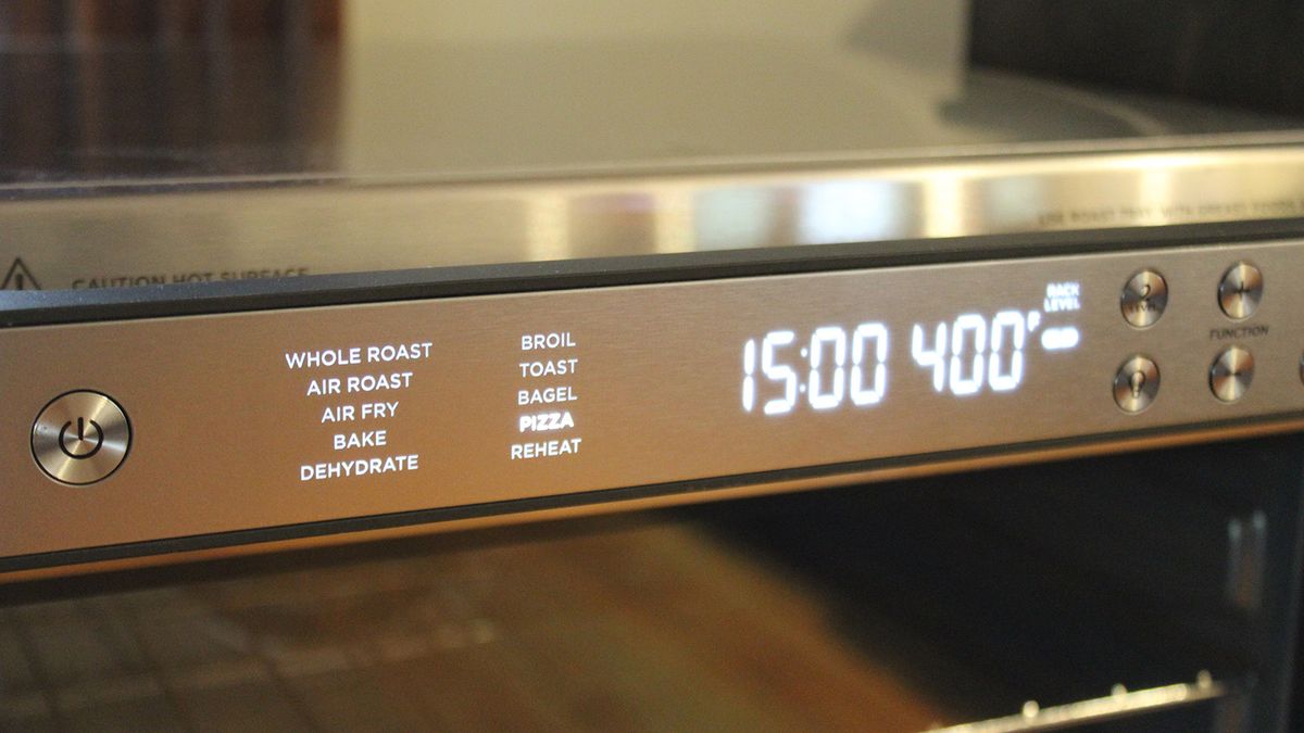 Ninja Prestige Smart XL Air Fryer &amp; Countertop Oven being tested in a white kitchen