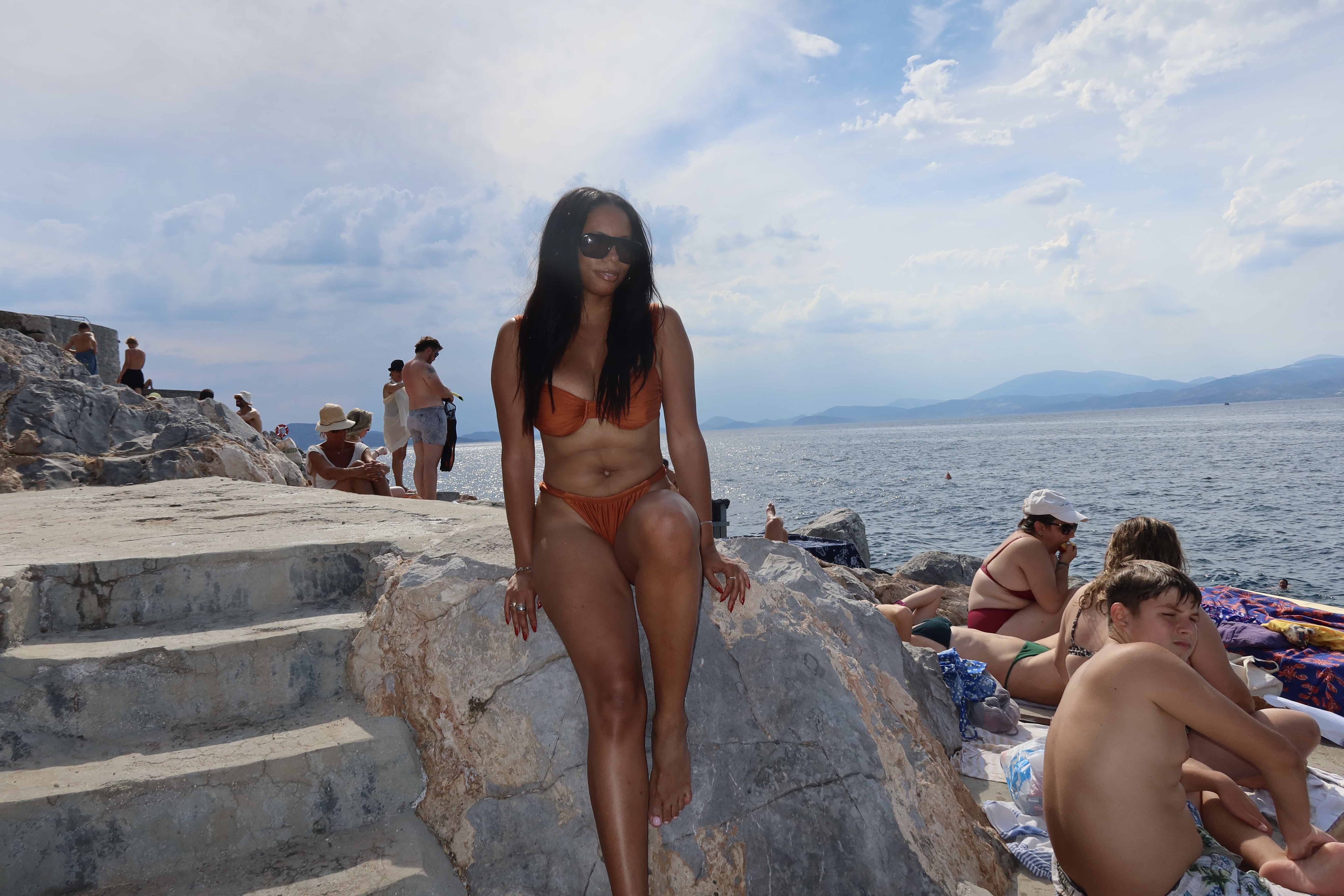 Sierra Mayhew wearing a swimsuit in Greece.