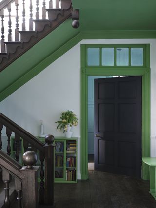A bright green door frame