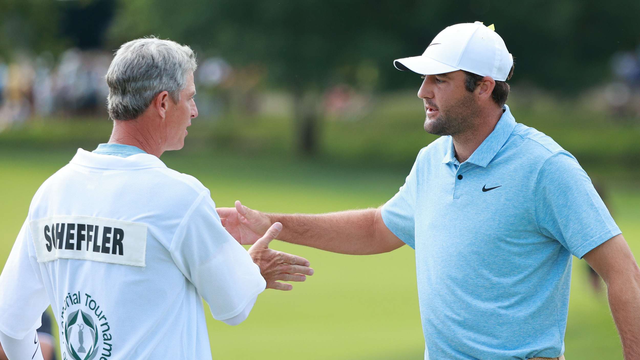 Ted Scott and Scottie Scheffler after claiming the Memorial Tournament title 