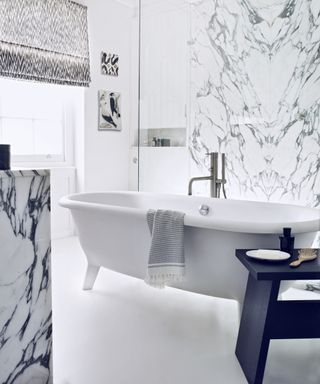 Arabescato marble Bathroom tile ideas by Simon-Bevan in a room with a blind and wall ceramics