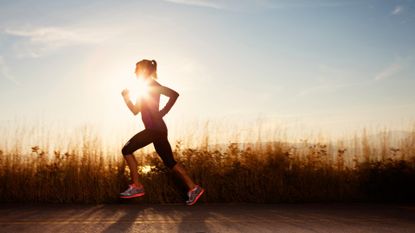 woman running along roadside