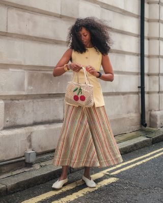 Summer shoe color: @thandimaq wears white flats