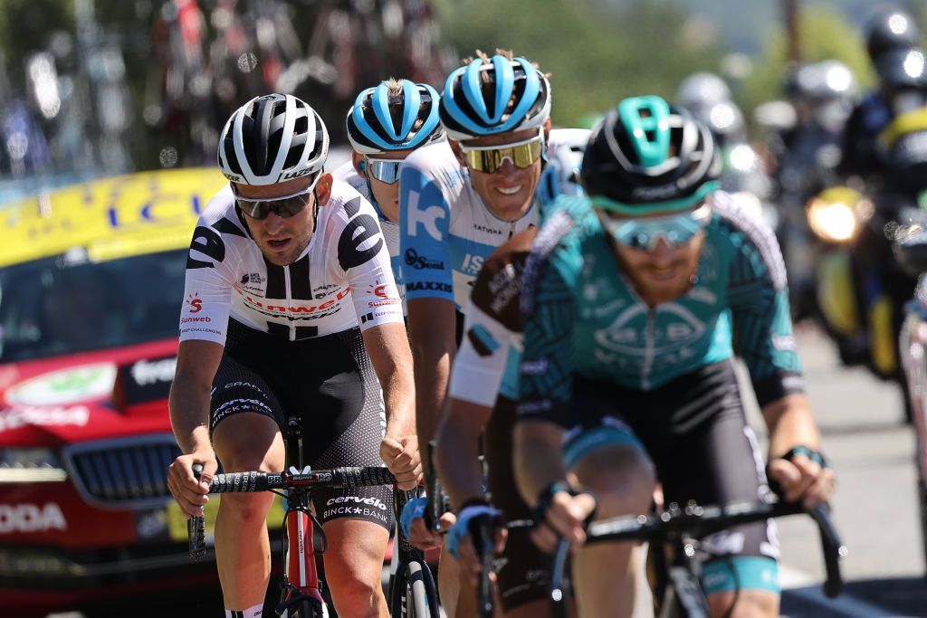 Team Sunweb rider Belgiums Tiesj Benoot L rides in a group at the front of the race during the 4th stage of the 107th edition of the Tour de France cycling race 157 km between Sisteron and OrcieresMerlette on September 1 2020 Photo by KENZO TRIBOUILLARD AFP Photo by KENZO TRIBOUILLARDAFP via Getty Images