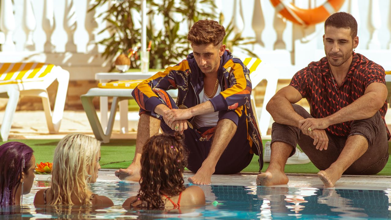 ENric Auquer, left, and Miguel Angel Silvestre in "Sky Rojo" on Netflix.