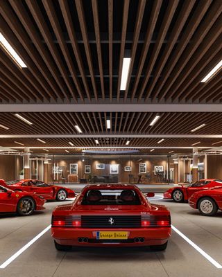 Ferrari seen from rear in underground Garage Deluxe