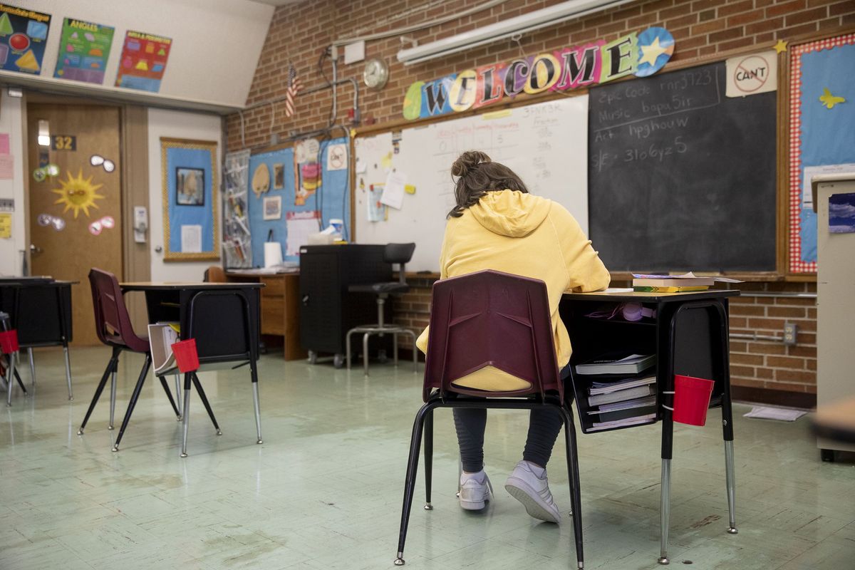 A student works at a desk in a fifth grade classroom in Princeton, Illinois, on Sept. 1, 2020.