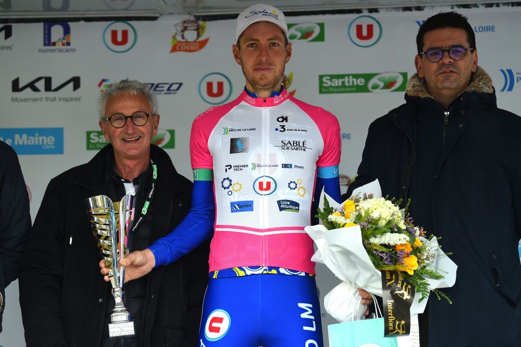 LA CHAPELLESAINTAUBIN FRANCE APRIL 08 Mal Guegan of France and Team U Nantes Atlantique Pink Mountain Jersey celebrates at podium during the 68th Circuit Cycliste Sarthe Pays de la Loire 2022 Stage 4 a 1364km stage shortened due to bad weather conditions from La ChapelleSaintAubin to La ChapelleSaintAubin CircuitSarthe on April 08 2022 in La ChapelleSaintAubin France Photo by Dario BelingheriGetty Images