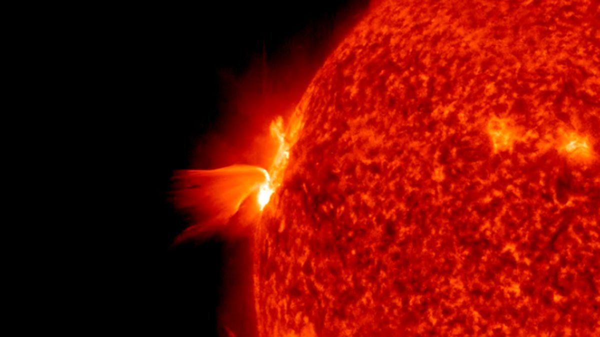 The massive X1.1 class solar flare detected on Sunday now seems to be from a third active region of sunspots that's rotating onto the sun's visible disk behind the other two.