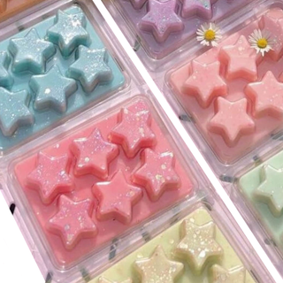 A block of star-shaped wax melts in pastel tones