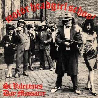 Enid –standing between 'Fast' Eddie and Lemmy – dolled up like a gangster's moll for the cover of the Motorhead/Girlschool St Valentine's Day Massacre EP