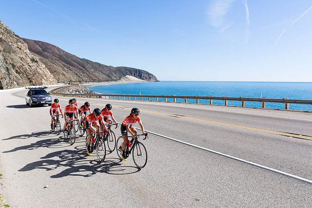 The women of Rally Cycling make their back up the coast after training in the canyons south of Oxnard, California.