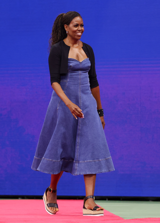 Michelle Obama attends Opening Night celebrating '50 years of equal pay' during Day One of the 2023 US Open at Arthur Ashe Stadium at the USTA Billie Jean King National Tennis Center on August 28, 2023 in the Flushing neighborhood of the Queens borough of New York City