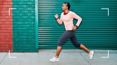 Brightly lit woman running along in workout clothes, representing quotes about running for motivation