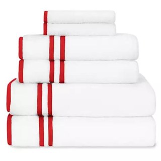 cut out of stack of red and white towels