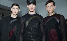 Three models wearing Calvin Klein casual clothing 