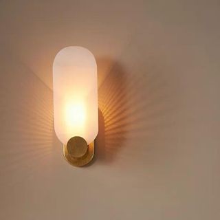 A retro gold wall sconce