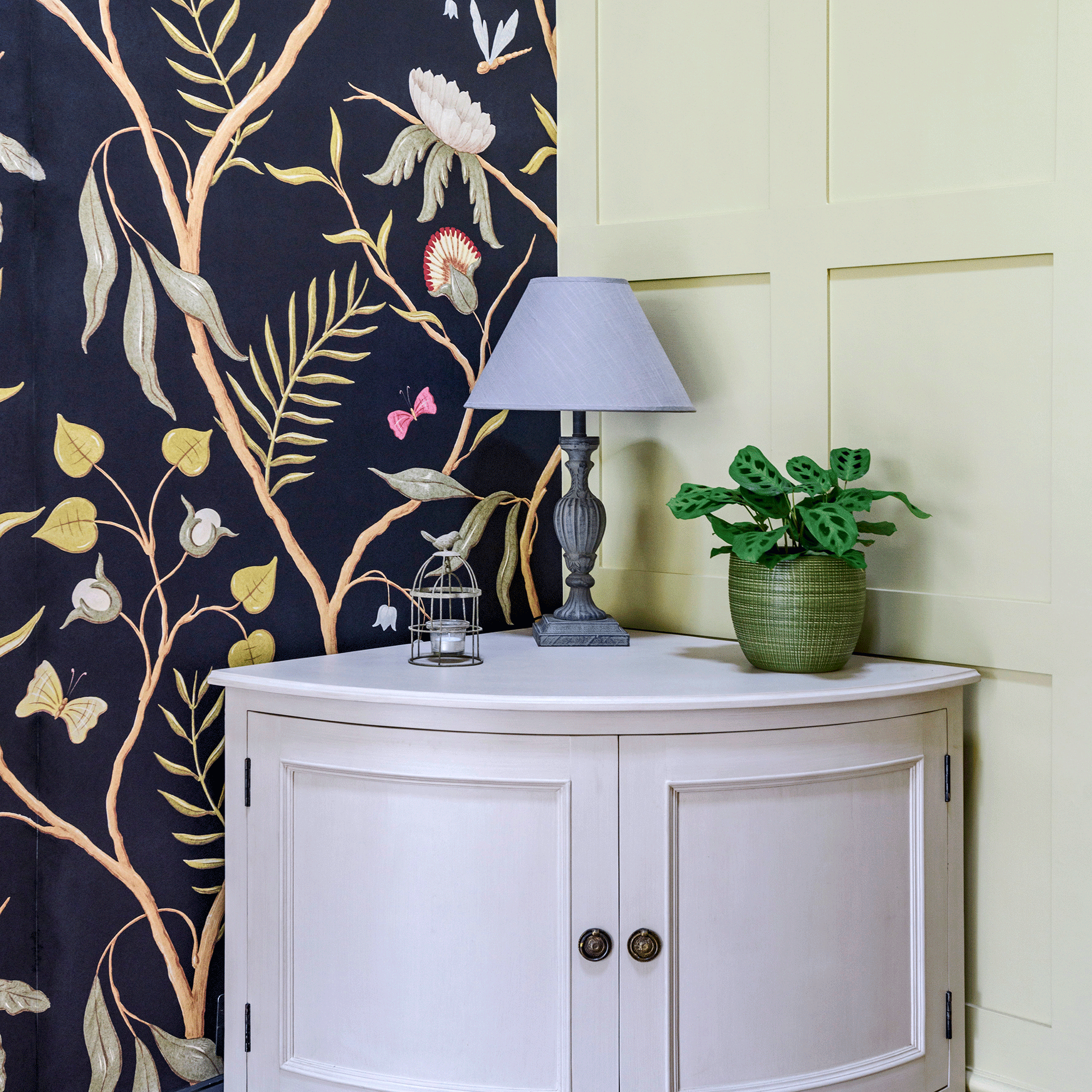 Navy wallpaper with grey corner cabinet