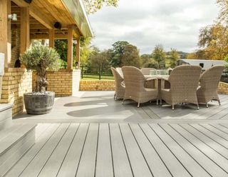 a garden decking idea with a mixed directions of boards