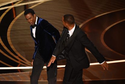 Jada Pinkett Smith - TOPSHOT - US actor Will Smith (R) slaps US actor Chris Rock onstage during the 94th Oscars at the Dolby Theatre in Hollywood, California on March 27, 2022. (Photo by Robyn Beck / AFP) (Photo by ROBYN BECK/AFP via Getty Images)