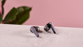 Earfun Air 2 NC earbuds on surface